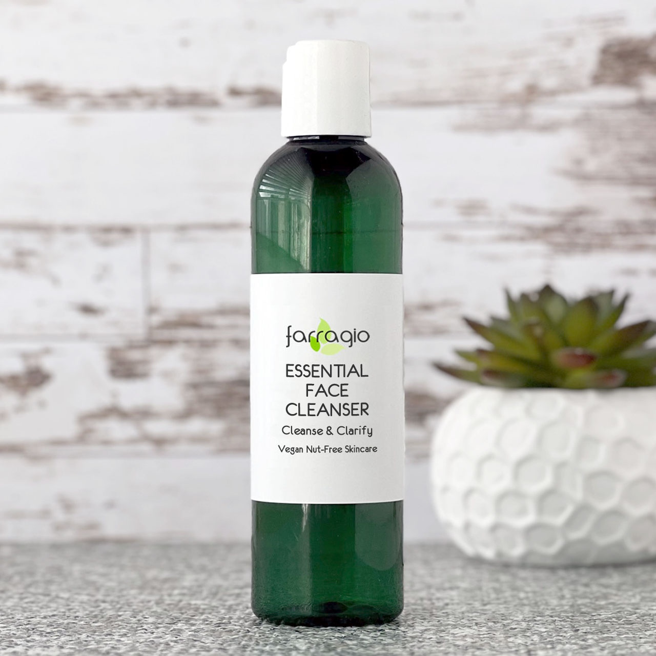 green bpa-free plastic bottle of natural face cleanser